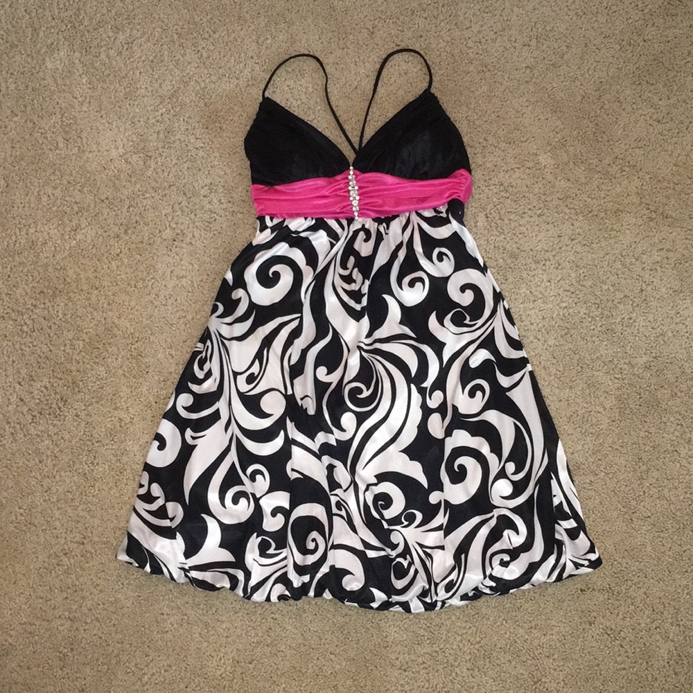 Black and white dress with pink ribbon
